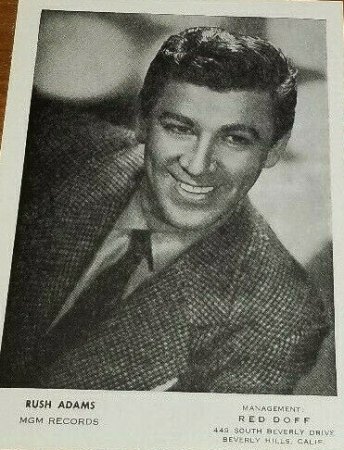 RUSH "RUSTY" ADAMS