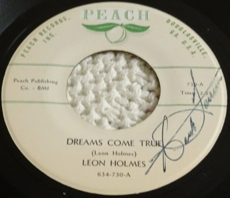 LEON HOLMES