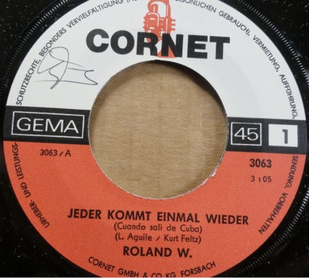 ROLAND W.