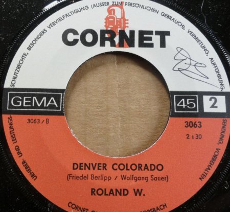 ROLAND W.