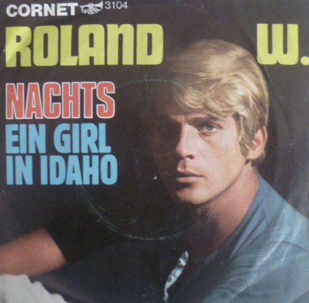 ROLAND W.