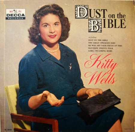 Wells_Kitty_-_Dust_on_the_Bible.jpeg